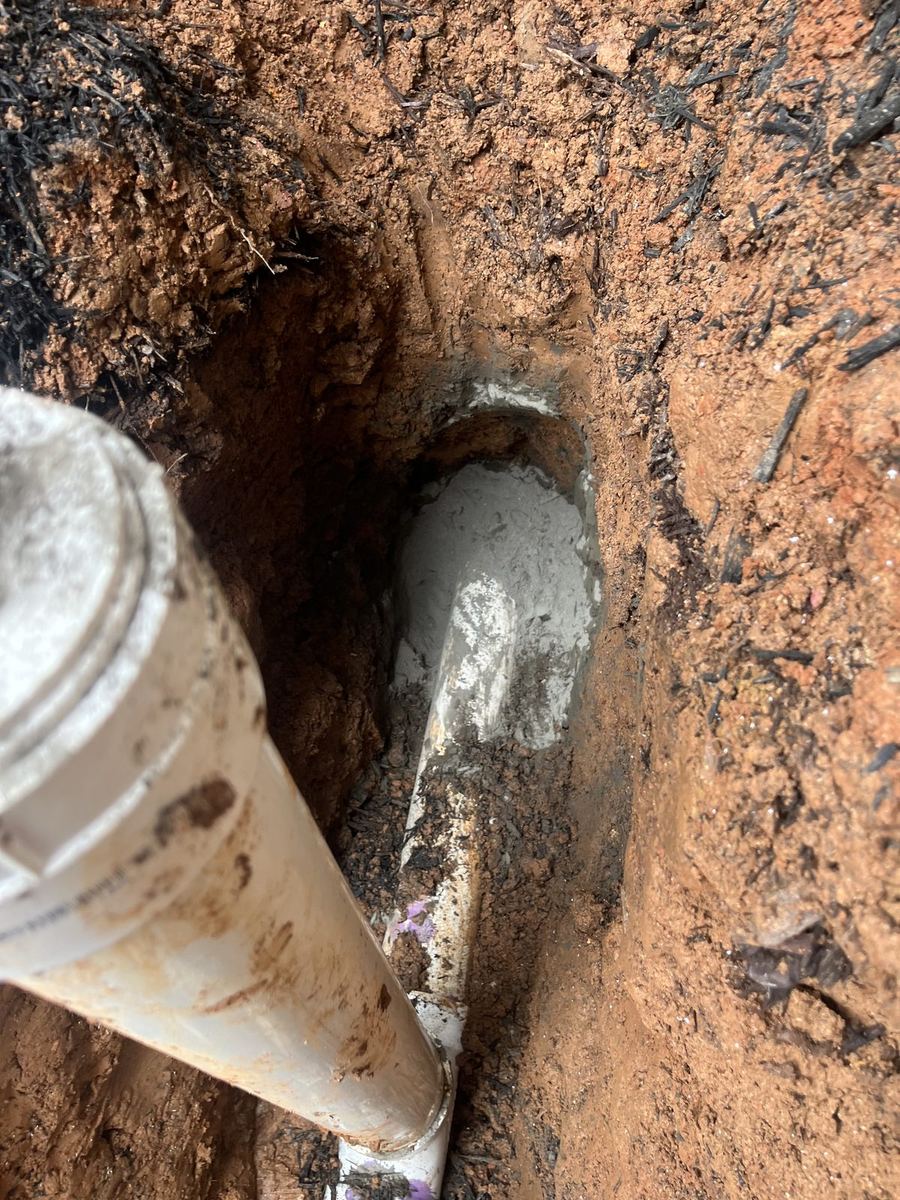 Outlet baffle access — common repair point on aging concrete tanks.