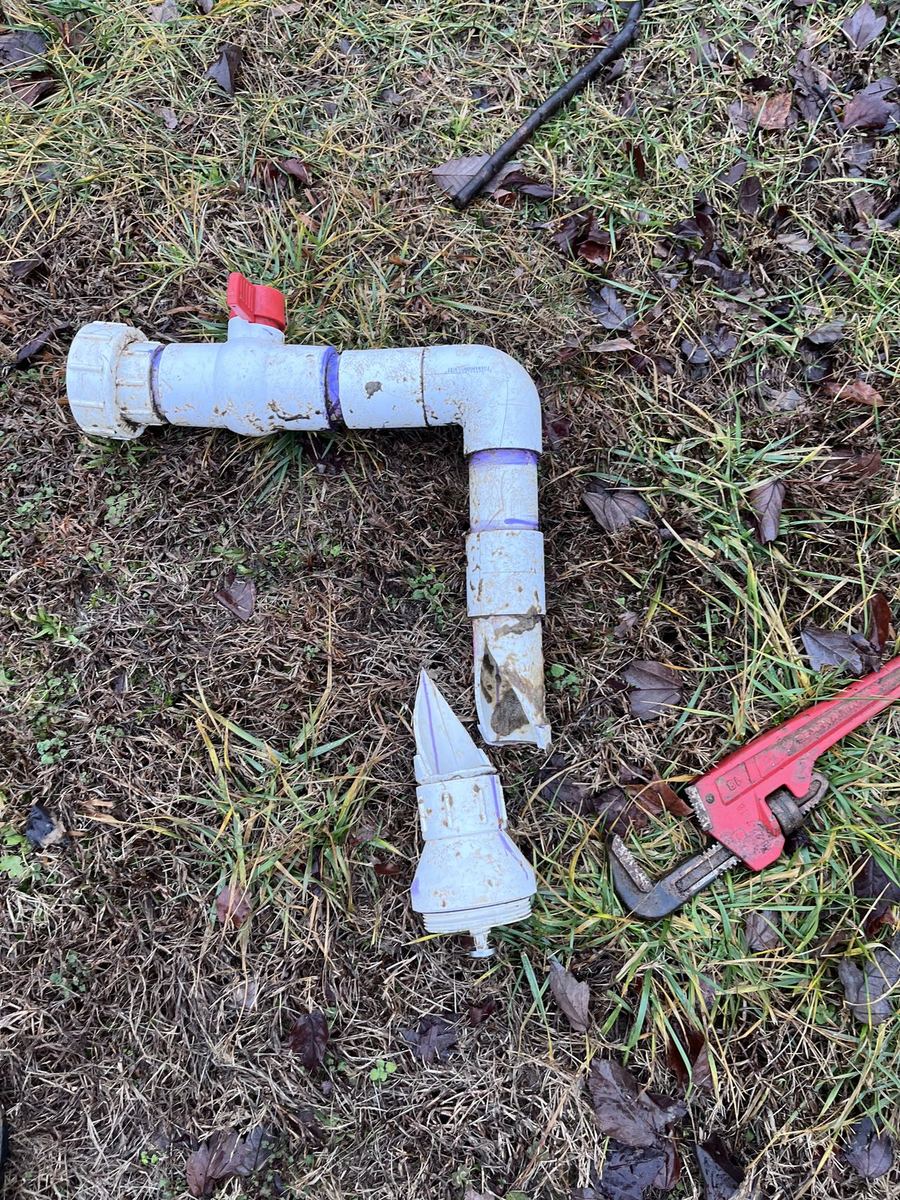 Ejection pump discharge piping with check valve and union.