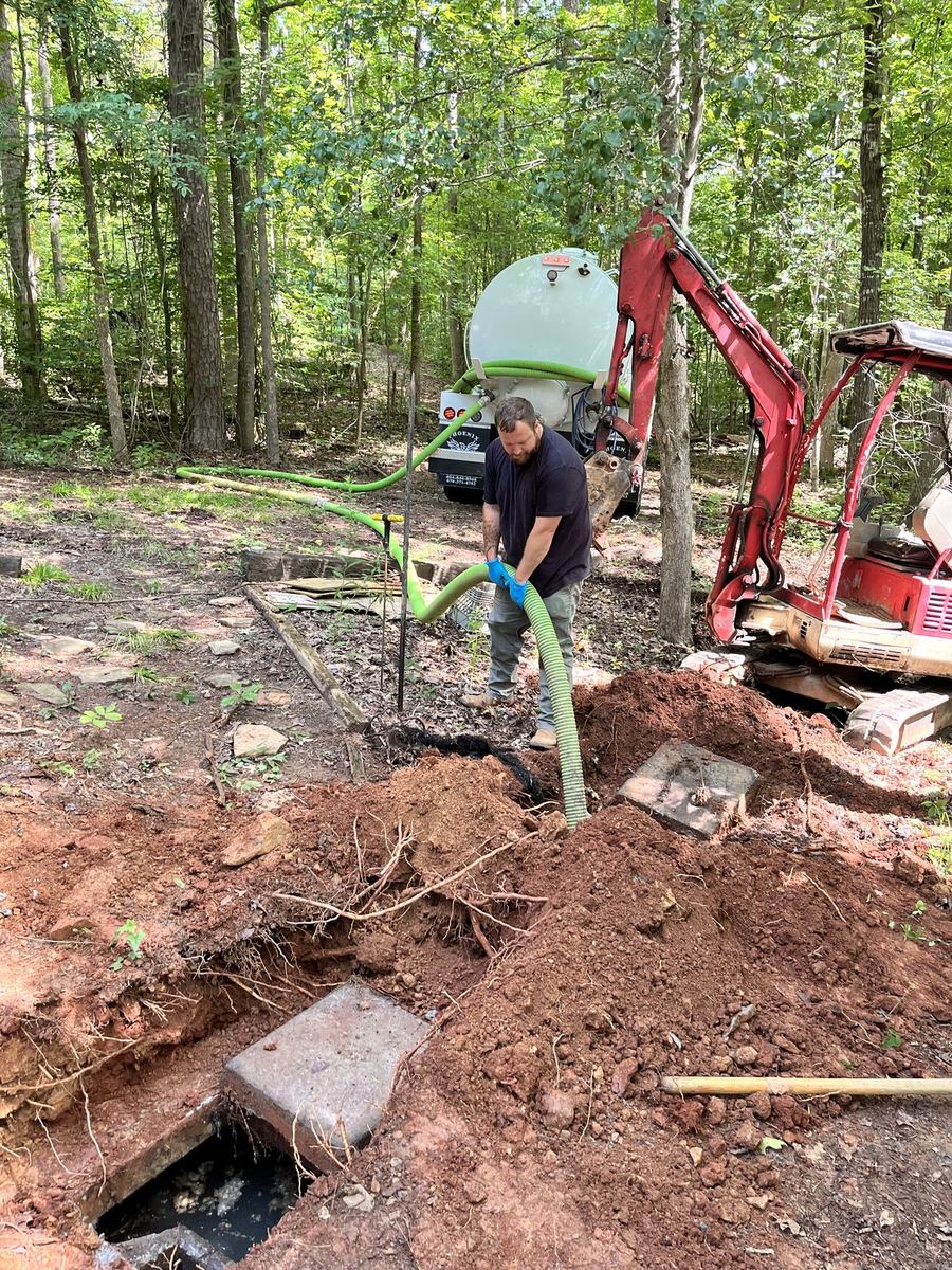 Mini excavator on residential septic job