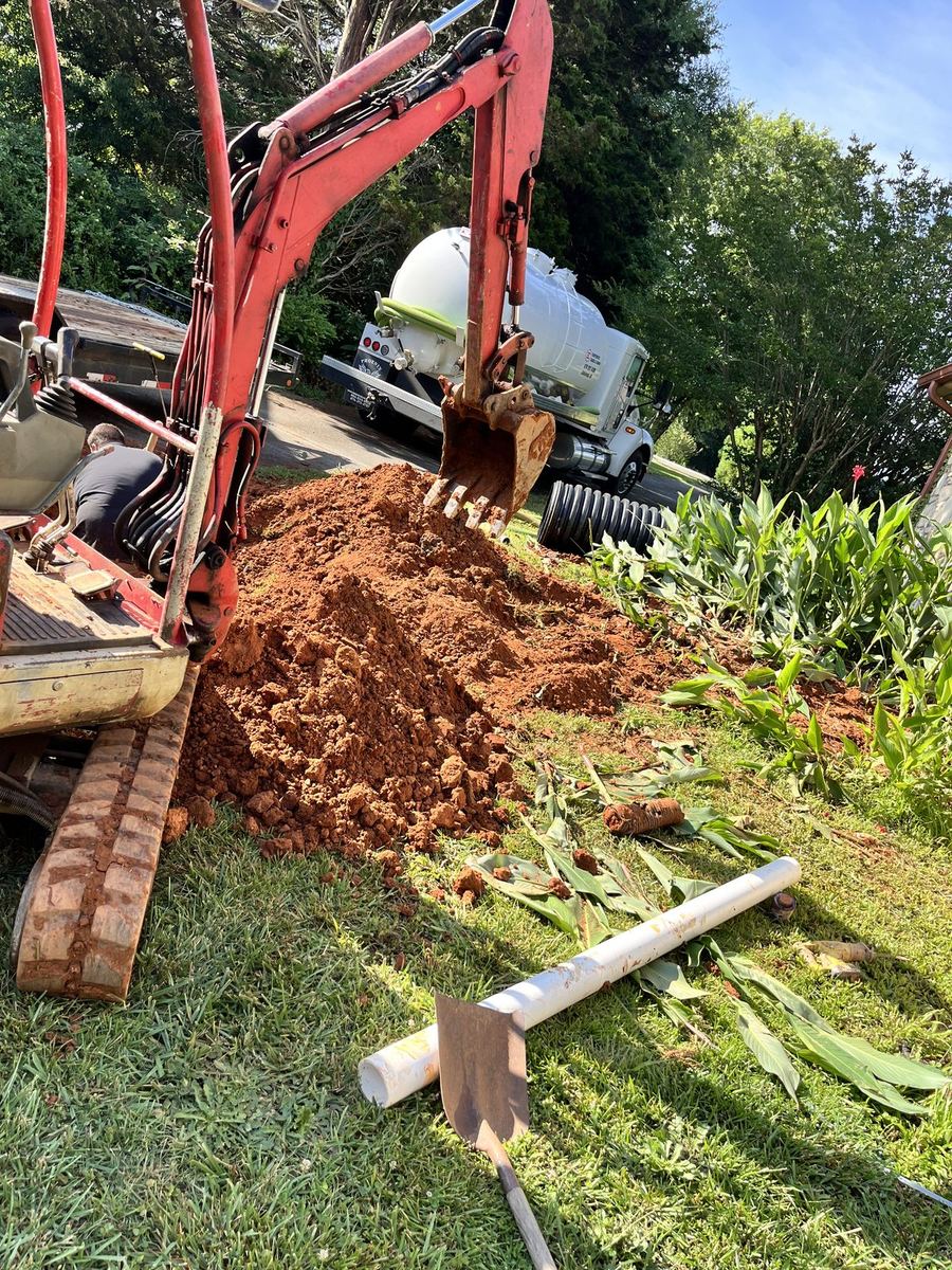 Tight-yard excavator work — minimal disturbance, max precision.